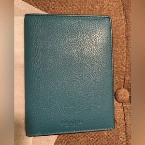 Like new Coach passport wallet.
